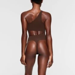 FITS EVERYBODY ONE SHOULDER CUT OUT BODYSUIT | COCOA -Deals Easy Allure Wardrobe Store SKIMS BODYSUIT BD THG 3042 NB COA 015 BK