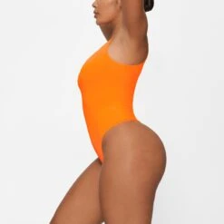 ESSENTIAL ONE SHOULDER BODYSUIT | ORANGE HIGHLIGHTER -Deals Easy Allure Wardrobe Store SKIMS BODYSUIT BD THG 3703 GA ORH 0009 SD