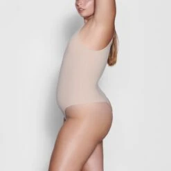 FITS EVERYBODY HIGH NECK BODYSUIT | MICA -Deals Easy Allure Wardrobe Store SKIMS BODYSUIT BS BST 0232 AT MCA SD 3fa89158 a3c0 48da 8db3 9401673d65fd