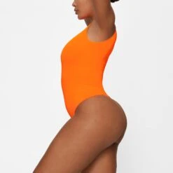 ESSENTIAL CREW NECK SLEEVELESS BODYSUIT | ORANGE HIGHLIGHTER -Deals Easy Allure Wardrobe Store SKIMS BODYSUIT HS BST 0113 GA ORH 0012 SD 28ba55fb 56b2 482a a004 db5f0938d6cd