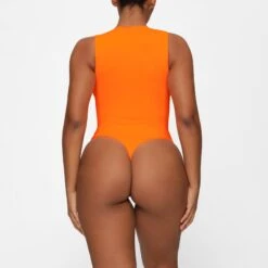 ESSENTIAL CREW NECK SLEEVELESS BODYSUIT | ORANGE HIGHLIGHTER -Deals Easy Allure Wardrobe Store SKIMS BODYSUIT HS BST 0113 GA ORH 0017 BK c7ad5583 4250 4275 a040 2105a036f407