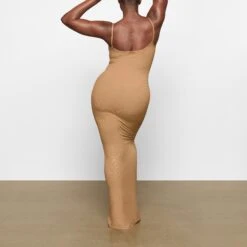 SOFT LOUNGE SHIMMER LONG SLIP DRESS | CAMEL -Deals Easy Allure Wardrobe Store SKIMS LOUNGEWEAR AP DRS 0596 XC CMF 0012 BK